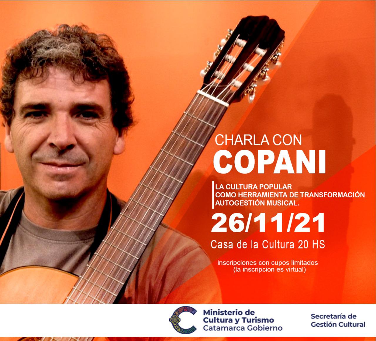 Charla con Copani